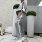✨ Set pentru femei cu dungi – pantaloni largi și top, croială avantajoasă